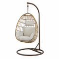 Chaise suspendue en rotin et métal avec coussins beige