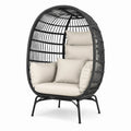 Fauteuil en rotin avec coussins en tissu beige